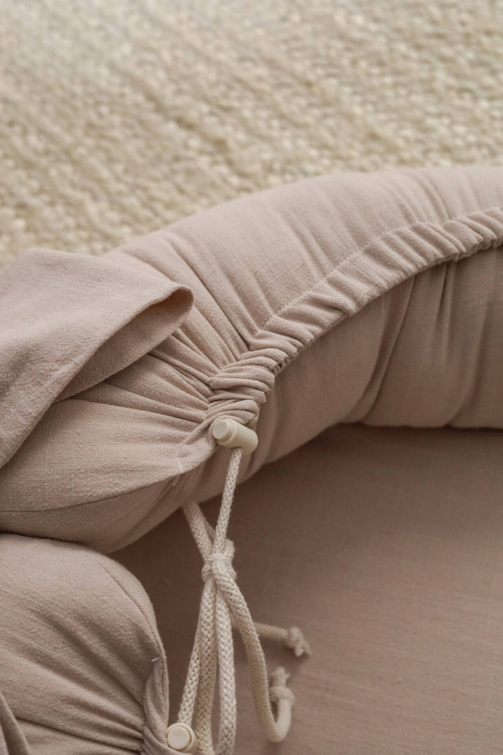 Detail of the beige linen baby nest